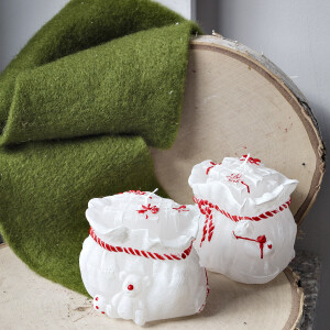 Stimmungsvolle Geschenk-Kerze als festliches Highlight