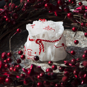 Stimmungsvolle Geschenk-Kerze als festliches Highlight
