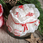 Stimmungsvolle Geschenk-Kerze als festliches Highlight